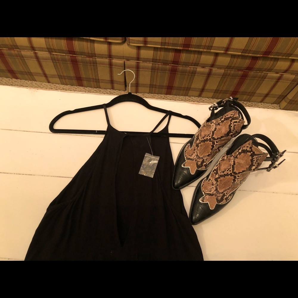 New black perfect little black dress . Size Large fits like a small.